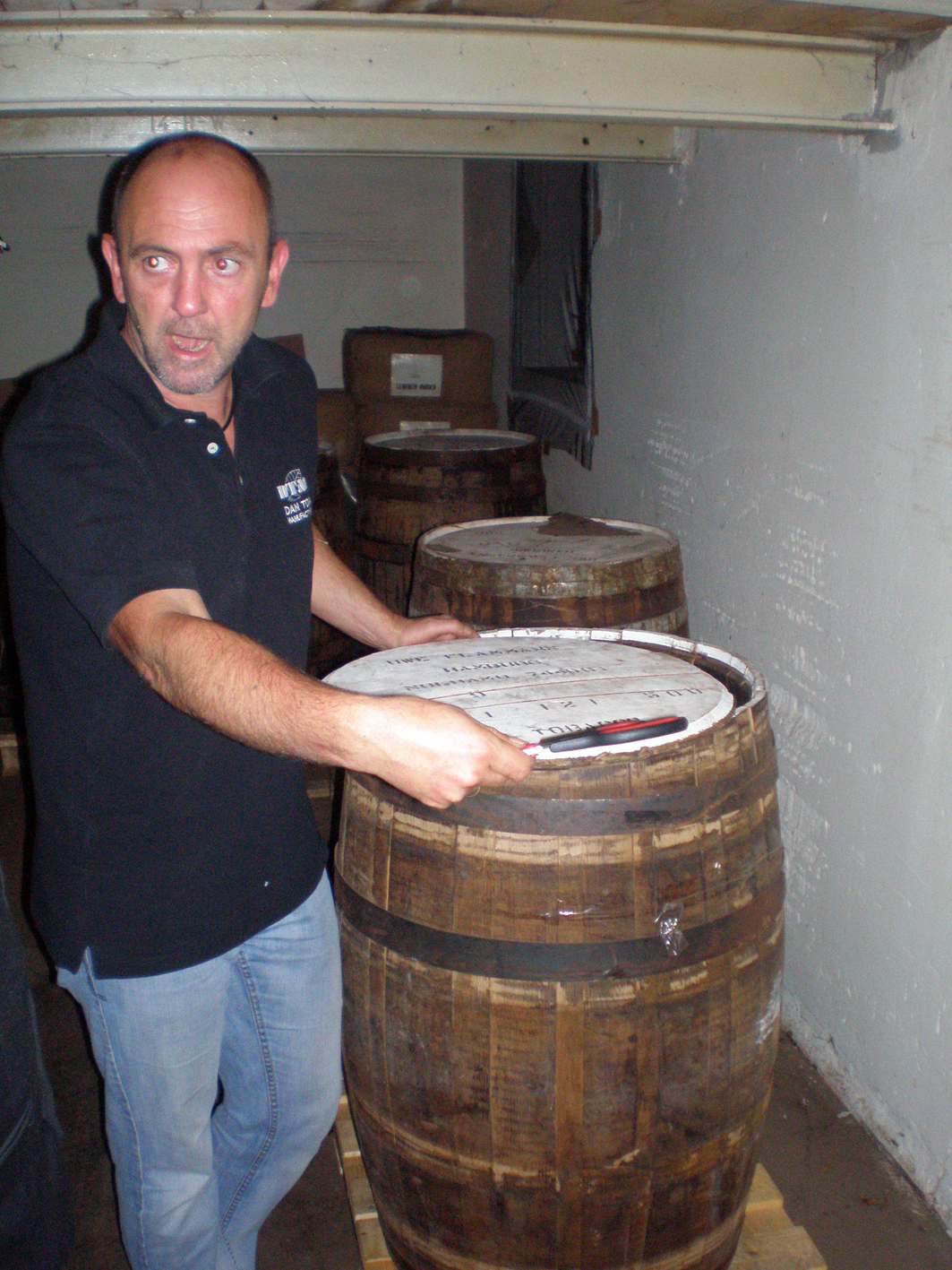 Masterblender Andreas Mund of DTM with a barrel of perique